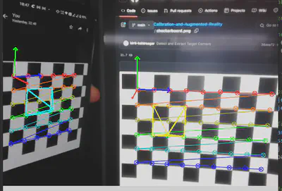 Two checkerboards of different sizes tracked simultaneously, each with its own coloured wireframe pyramid