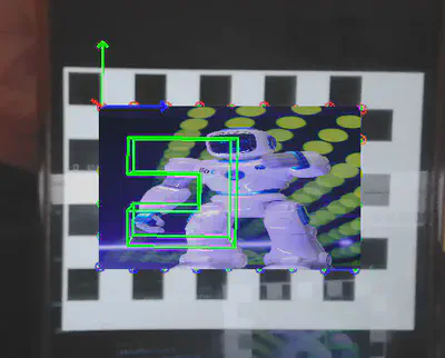 An arbitrary image warped over the chessboard region with the virtual object drawn on top